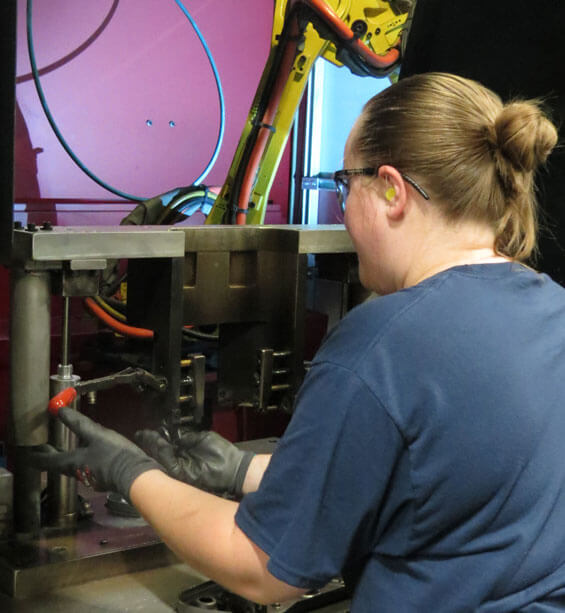 Employee working with robotics