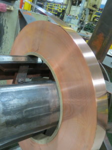 Copper metal coil for a metal stamping press