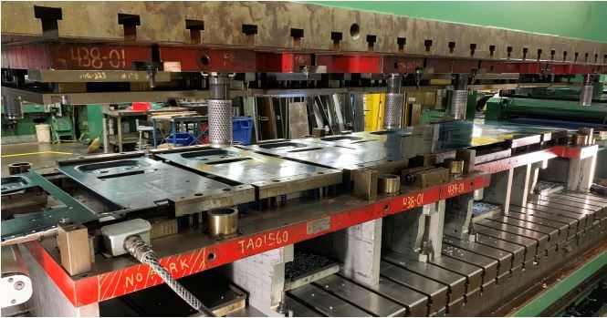 Aluminum frame progressive die
